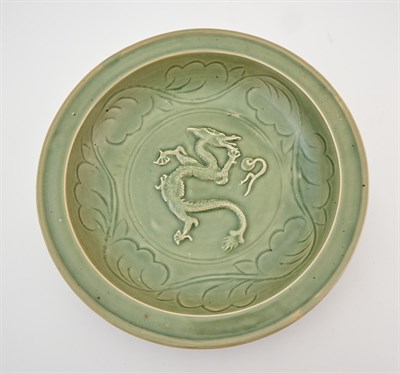 Lot 210 - A Chinese Carved Longquan Celadon Charger