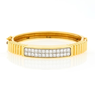 Lot 1274 - Two-Color Gold and Diamond Bangle Bracelet