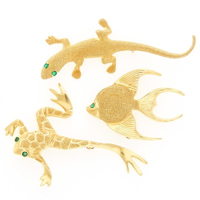 Lot 1228 - Three Gold and Emerald Frog, Lizard and Fish Pins