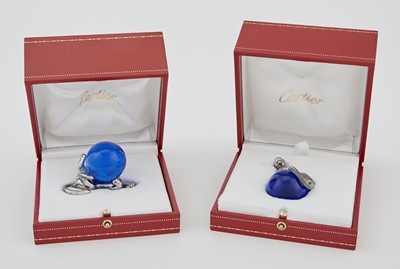 Lot 150 - Two Cartier Panthere Silver and Glass Table Ornaments