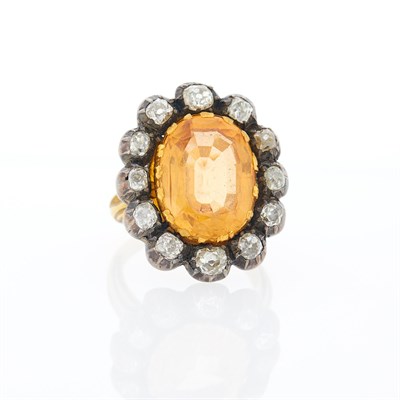 Lot 1180 - Gold, Topaz and Diamond Ring