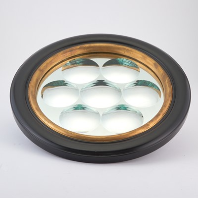 Lot 76 - Regency Style Parcel-Gilt Ebonized Circular Mirror