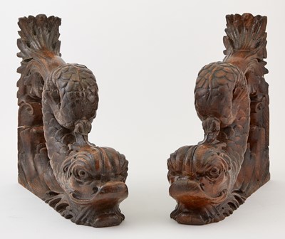 Lot 96 - Pair of Renaissance Style Carved and Dark Stained Wood Dolphin-Form Elements