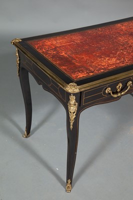 Lot 685 - Louis XV Ormolu-Mounted and Brass-Inlaid Ebonized Bureau Plat