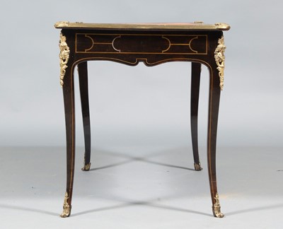 Lot 685 - Louis XV Ormolu-Mounted and Brass-Inlaid Ebonized Bureau Plat