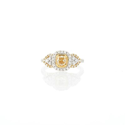 Lot 1243 - Two-Color Gold, Colored Diamond and Diamond Ring