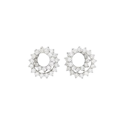 Lot 73 - Tiffany & Co. Pair of Platinum and Diamond 'Swirl' Earclips