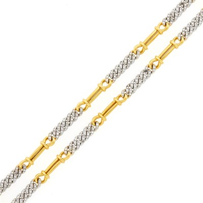 Lot 1120 - Pair of Two-Color Gold and Diamond Curb Link Bracelets