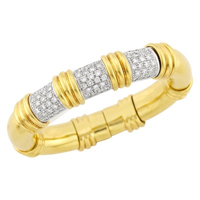 Lot 125 - Two-Color Gold and Diamond Bangle Bracelet