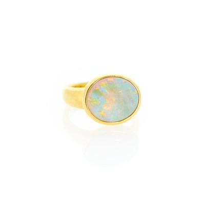 Lot 1249 - Darlene de Sedle Gold and White Opal Ring