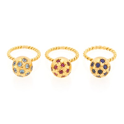 Lot 1076 - Three Gold and Gem-Set Stacking Ball Rings