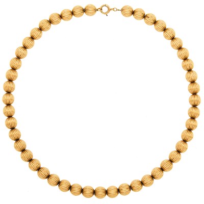 Lot 1065 - Gold Bead Necklace