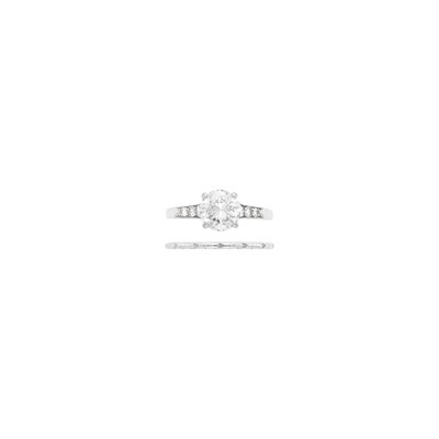 Lot 118 - Cartier Platinum and Diamond Ring and Band Ring