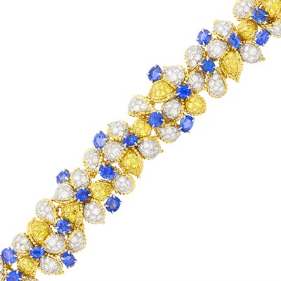 Lot 139 - Two-Color Gold, Sapphire, Colored Diamond and Diamond Flower Bracelet