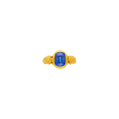 Lot 1046 - Gold and Synthetic Sapphire Ring