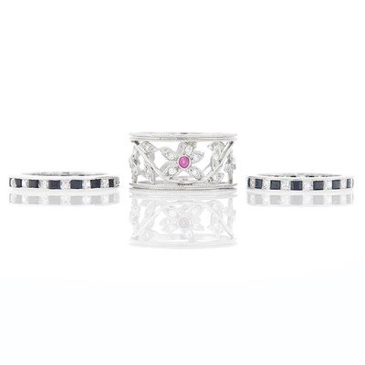 Lot 1156 - Pair of Platinum, Diamond and Sapphire Eternity Bands and Kathy Waterman Wide Platinum, Diamond and Ruby Band Ring