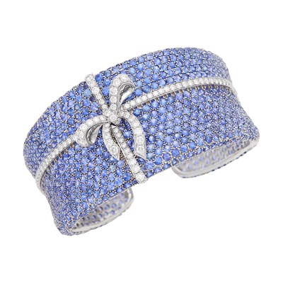 Lot 149 - White Gold, Sapphire and Diamond Bow Cuff Bangle Bracelet
