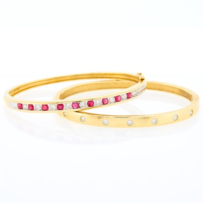 Lot 1123 - Two Gold, Diamond and Ruby Bangle Bracelets