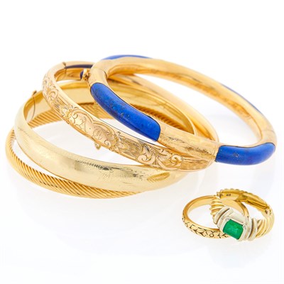Lot 1207 - Four Gold, Gold-Filled and Lapis Bangle Bracelets, Gold and Emerald Ring and Gold Band Ring