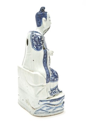 Lot 363 - A Chinese Blue and White Porcelain Figure of a Seated Immortal