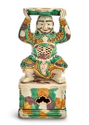 Lot 166 - A Chinese Famille Verte Biscuit Porcelain Figural Candle Holder