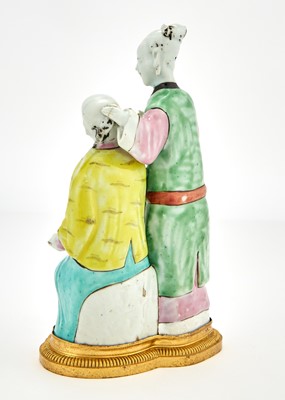 Lot 367 - A Chinese Porcelain 'Ear Cleaning' Group