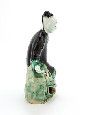 Lot 365 - A Chinese Famille Verte Glazed Biscuit Porcelain Figure