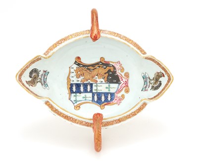 Lot 59 - A Chinese Export Porcelain Armorial Double-Spouted Sauceboat