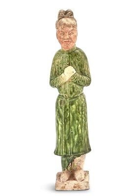 Lot 111 - A Chinese Green Glazed Pottery Figure of a Standing Attendant