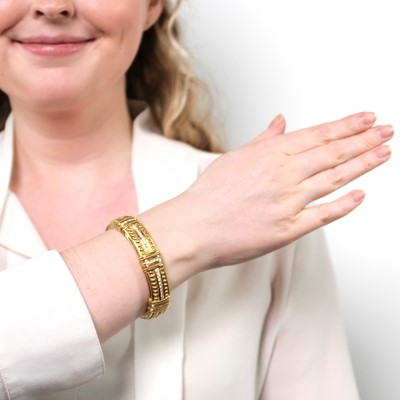 Lot 1146 - Gold and Diamond Bangle Bracelet