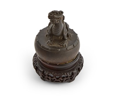 Lot 101 - A Chinese Bronze Scroll Weight