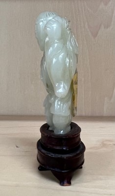 Lot 19 - A Chinese White Jade Carving of Liuhai