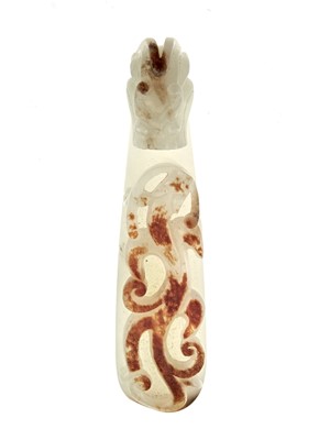 Lot 20 - A Chinese White and Russet Jade Belt Hook