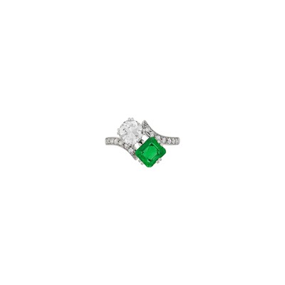 Lot 83 - Platinum, Diamond and Emerald Crossover Ring
