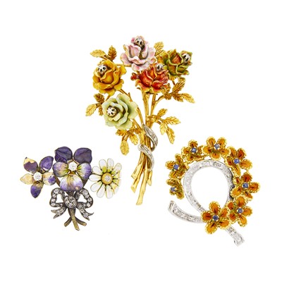 Lot 1205 - Three Gold, White Gold, Enamel and Diamond Floral Brooches