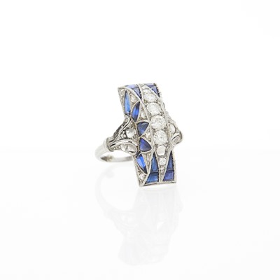 Lot 1162 - Platinum, Synthetic Sapphire and Diamond Dome Ring