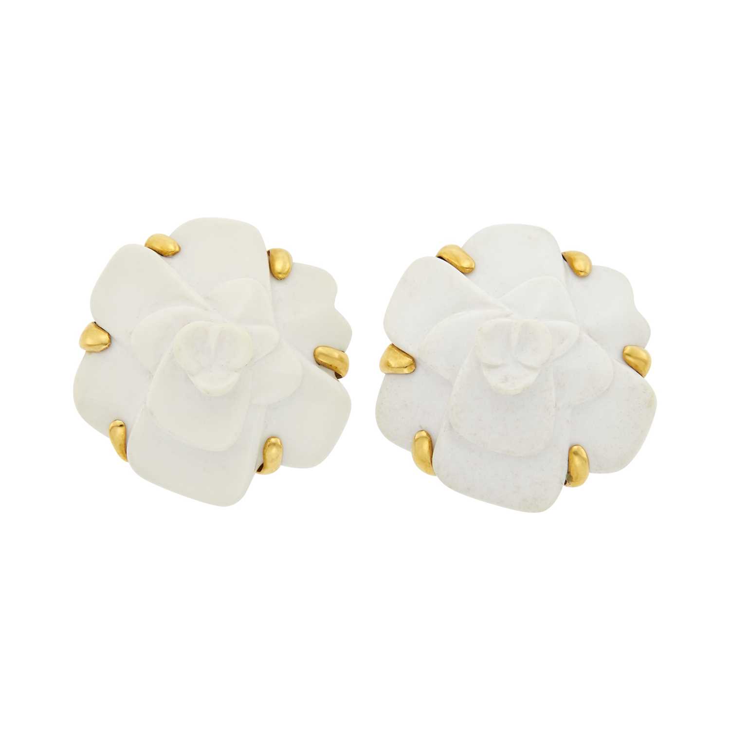 Lot 136 - Chanel Pair of Gold and White Ceramic 'Camelia' Earclips, France