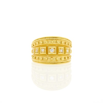 Lot 1085 - Wide Gold and Diamond Ring