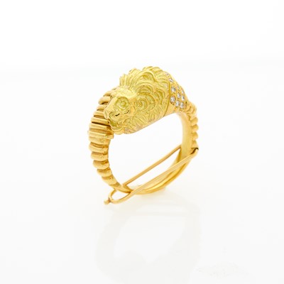 Lot 1142 - Gold and Diamond Lion's Head Crossover Ring