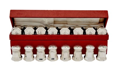 Lot 658 - Two Cased Sets of Cartier Sterling Silver Individual Salt and Pepper Casters