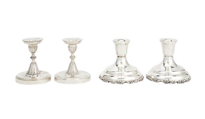 Lot 699 - Two Pairs of Silver Low Candlesticks