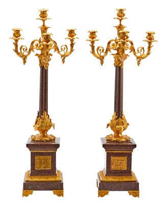 Lot 368 - Pair of Empire Style Gilt Bronze and Porphyry Three-Light Candelabra