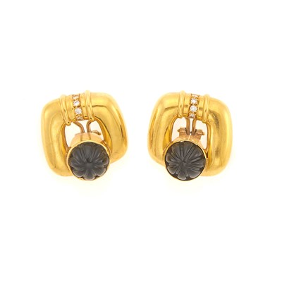 Lot 1134 - Pair of Gold, Carved Black Onyx and Diamond Earclips
