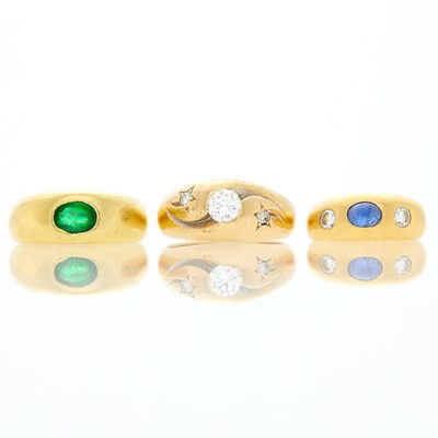 Lot 1110 - Cartier and Birk's Three Gold, Low Karat Gold, Cabochon Sapphire, Emerald and Diamond Gypsy Rings