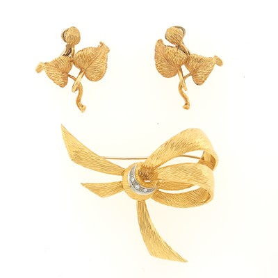 Lot 1073 - Two-Color Gold and Diamond Bow Brooch and Pair of Leaf Earclips