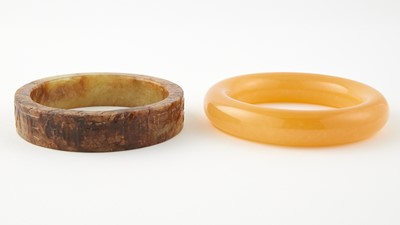 Lot 9 - A Chinese Jade Bangle Together With an Agate Hardstone Bangle