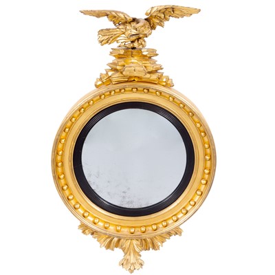 Lot 675 - Classical Giltwood and Part-ebonized Convex Mirror
