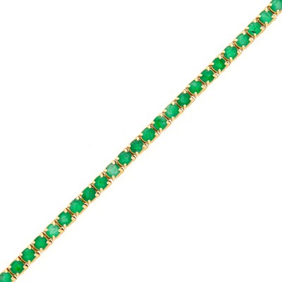 Lot 1119 - Gold and Emerald Bracelet