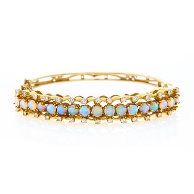 Lot 1062 - Gold, White Opal and Diamond Bangle Bracelet