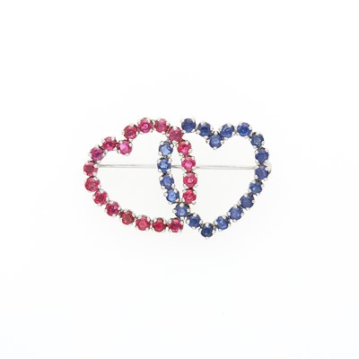 Lot 1267 - White Gold, Ruby and Sapphire Double Heart Pin